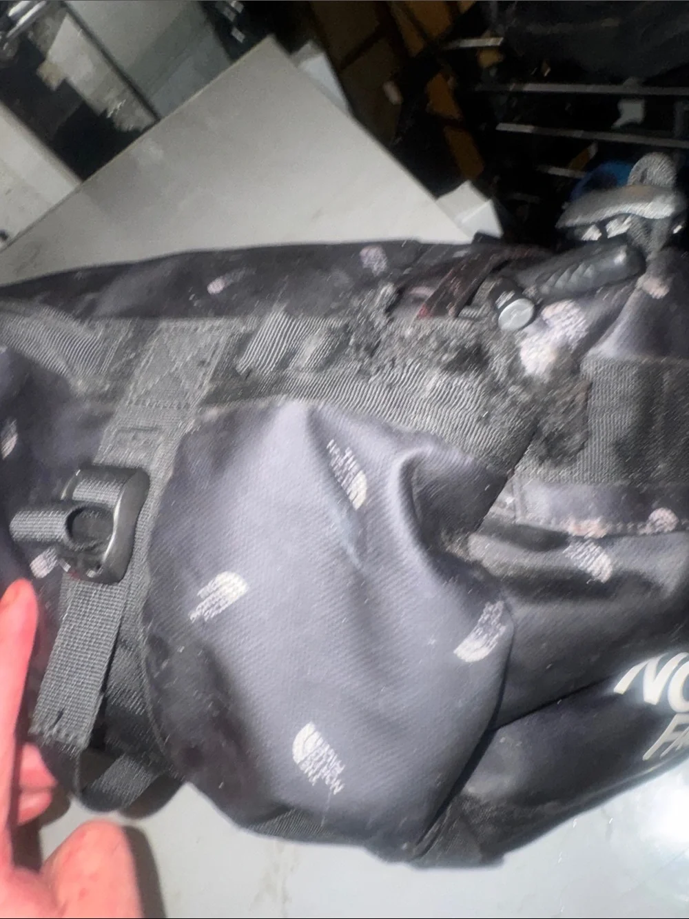 The North Face limited edition Black Duffel Messenger Bag with TNF logo repeat